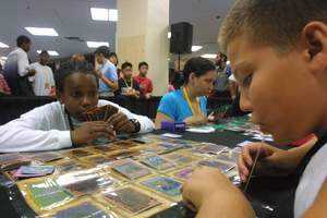 Yu-Gi-Oh! Trading Card Game fans engaged in a Yu-Gi-Oh! duel.
